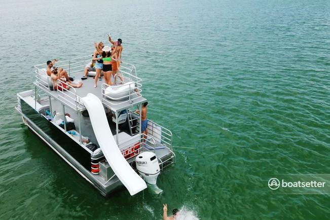 Double decker boat with water slide 