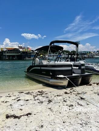 Beautiful CAPTAINED black & silver Tritoon with a 225 hp Mercury. 