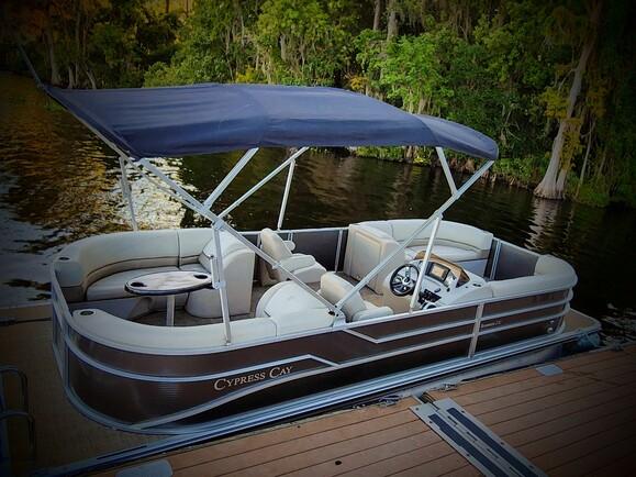 23ft Cypress Tritoon 12pp capacity 150hp with tubing included.